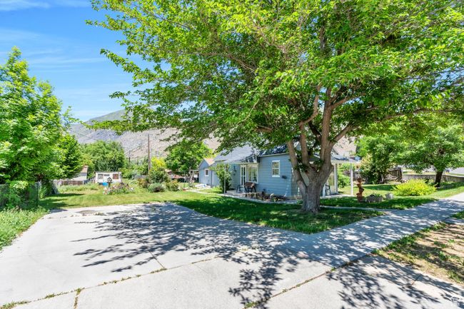 View of front facade with a front yard and a mountain view | Image 15