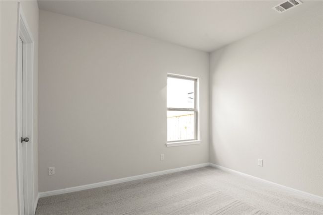 Spare room with light colored carpet and baseboards | Image 25