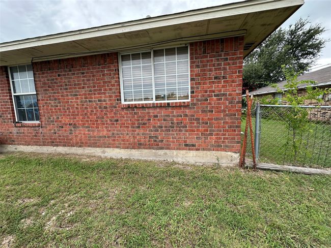 View of side of home featuring brick siding | Image 22