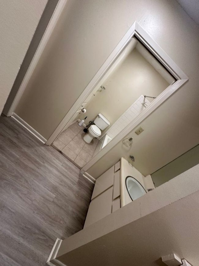 Bathroom with wood finished floors | Image 24