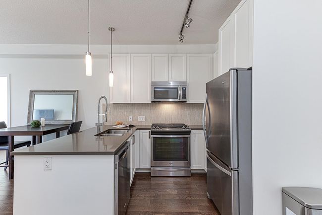 310 - 12409 Harris Rd, Condo with 2 bedrooms, 1 bathrooms and 1 parking in Pitt Meadows BC | Image 5