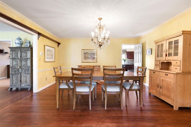 Formal dining room open to living room and kitchen | Image 11