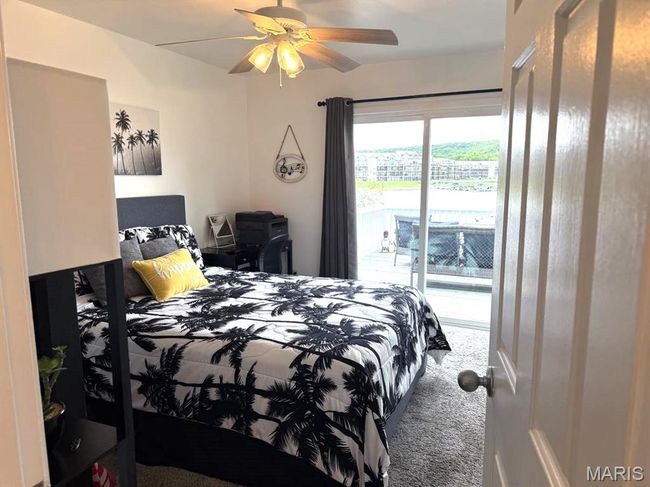 Carpeted bedroom with access to exterior and a ceiling fan | Image 27