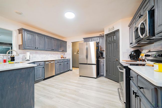 1557 Driskell Bridge Rd, House other with 5 bedrooms, 3 bathrooms and null parking in Harleton TX | Image 14