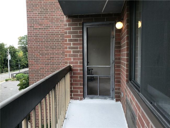 Entrance to property featuring a balcony | Image 9
