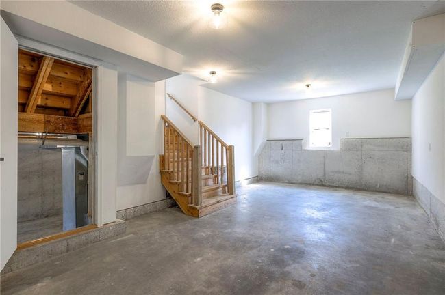 Below grade area featuring stairway | Image 23