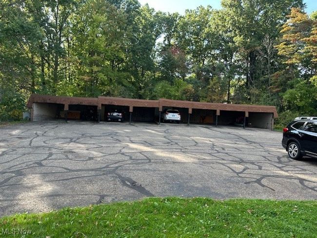 View of parking / parking lot with a carport | Image 21