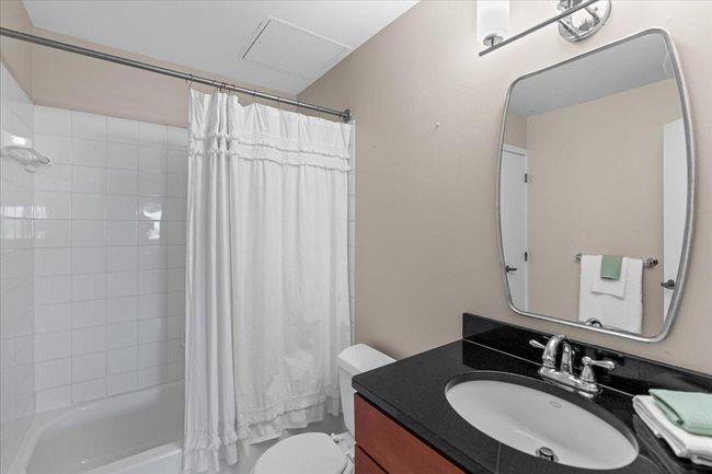 Bathroom includes an additional linen closet | Image 8
