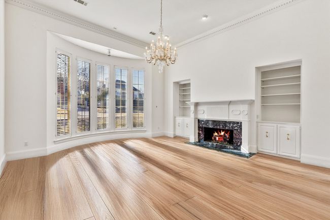 Enhanced Photo of formal living with hardwoods instead of carpet | Image 12