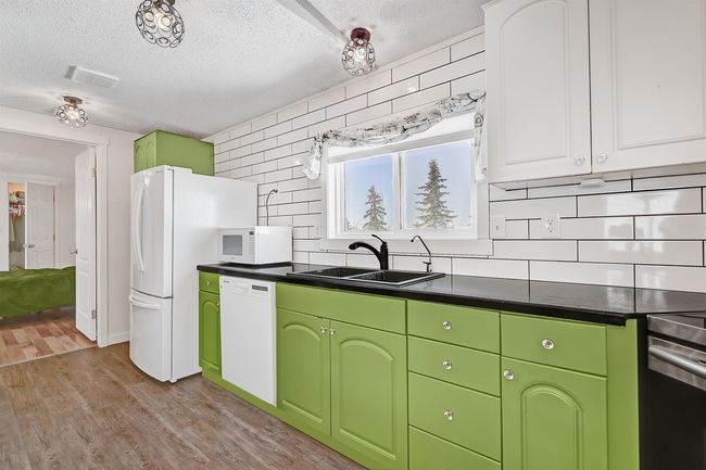 119 Clark Cres, Home with 3 bedrooms, 2 bathrooms and 2 parking in County Of Grande Prairie No. 1 AB | Image 4
