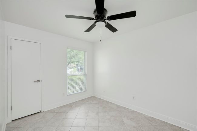 Unfurnished room with baseboards and ceiling fan | Image 21
