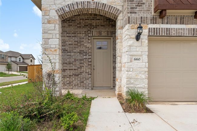 Property entrance featuring brick siding and stone siding | Image 4