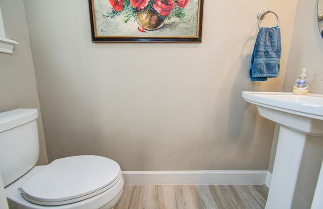 Half bath with pedestal sink. | Image 36