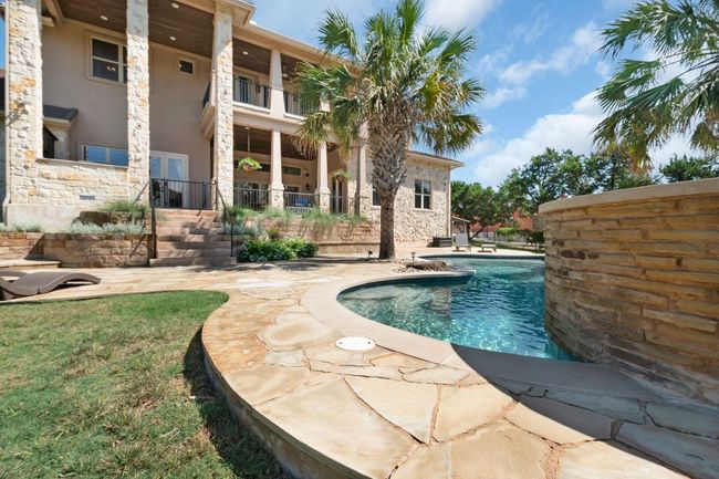 Outdoor pool with a patio area | Image 34