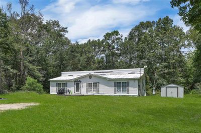 335 County Road 3892, House other with 3 bedrooms, 2 bathrooms and null parking in Cleveland TX | Image 2