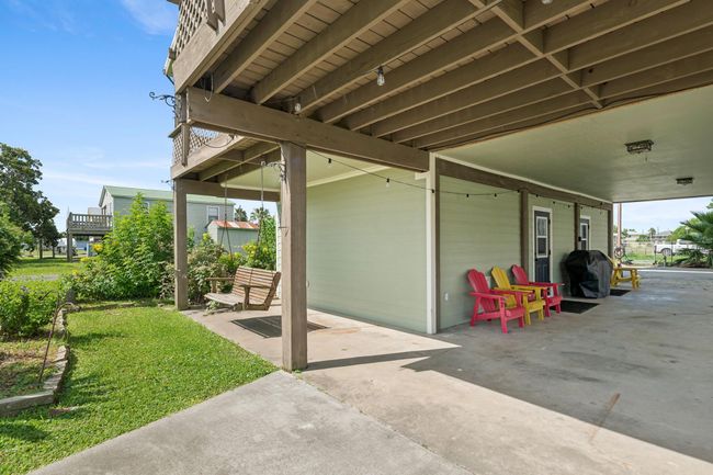 View from the front the house of the patio and downstairs | Image 4