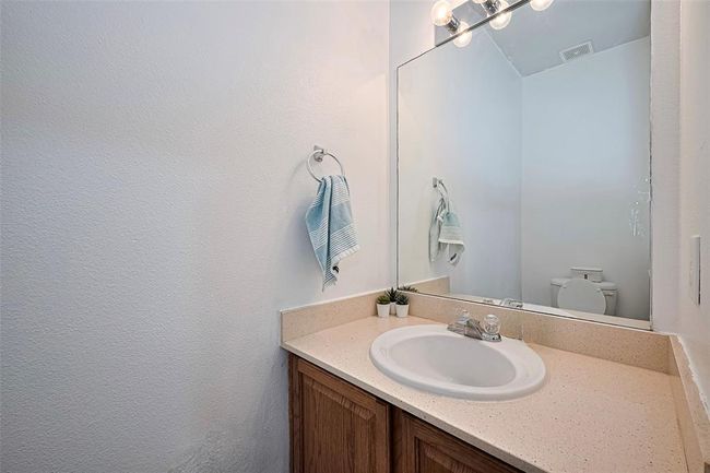 Downstairs powder room. | Image 8