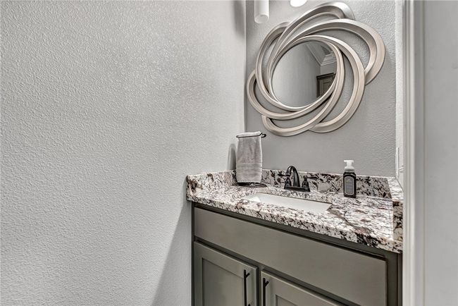 Door to the garage, stairs upstairs to all 4 bedrooms. Convenient to keep an eye on everyone. | Image 18