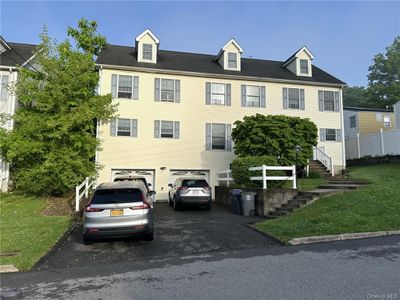 View of front of property featuring a garage | Image 1