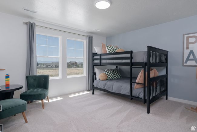 Carpeted bedroom with baseboards and a textured ceiling | Image 10