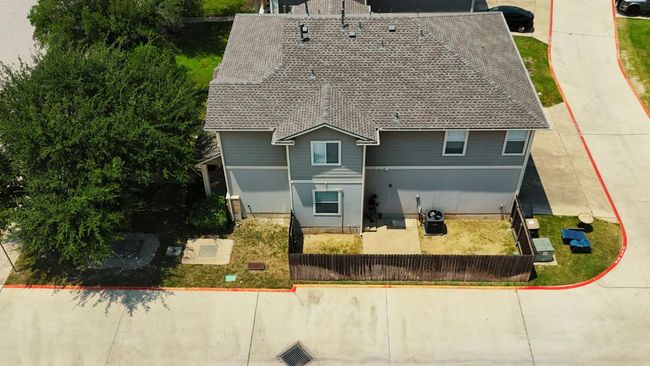 View of new roof and alley access to garage. | Image 26