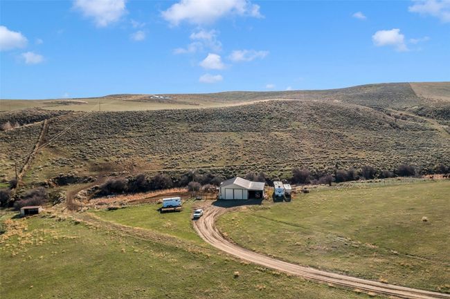 Overview of rural landscape featuring a mountain backdrop | Image 4