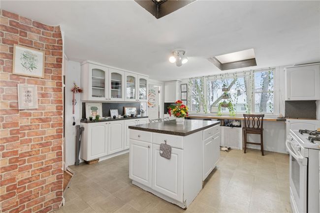 60 Standish Ave, Home with 8 bedrooms, 3 bathrooms and 2 parking in Cranston RI | Image 19