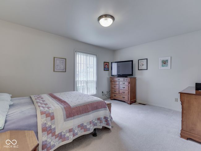 Spacious primary bedroom | Image 22