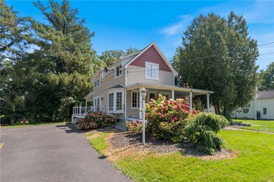 This renovation kept the original FARMHOUSE style and added SO MANY amenities! | Image 1