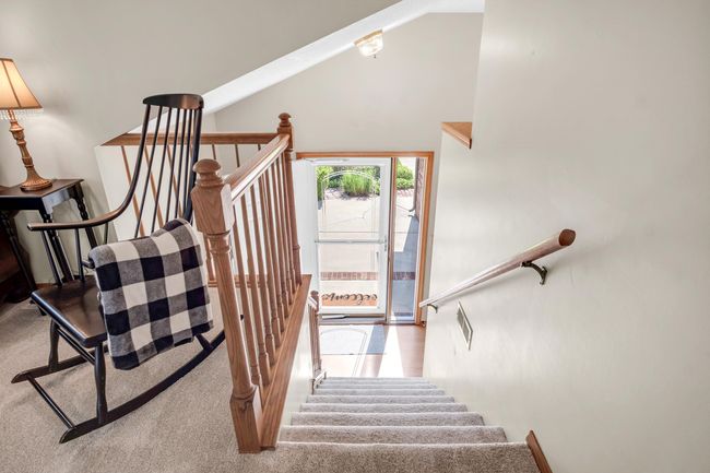 Staircase with lofted ceiling | Image 7