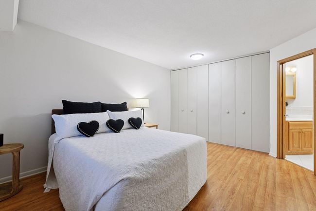 Private “Primary Bedroom” features extra large floor-to-ceiling closets. | Image 31