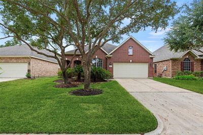 Welcome home to 5238 Katy Arbor Lane in the Heritage Grand community in Cinco Ranch. | Image 1