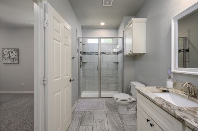 Master Bath featuring enclosed shower, double vanity | Image 9