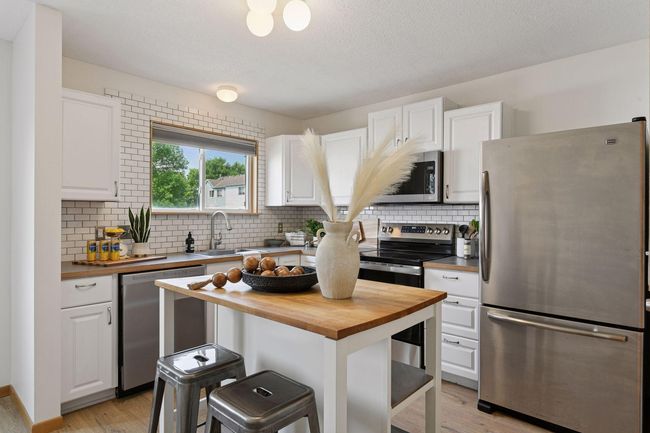 Kitchen with stainless steel appliances | Image 6