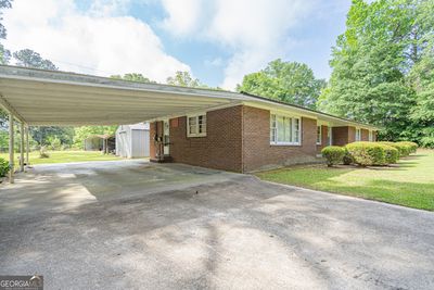 8828 Burkhalter Road, Home with 3 bedrooms, 1 bathrooms and null parking in Statesboro GA | Image 2