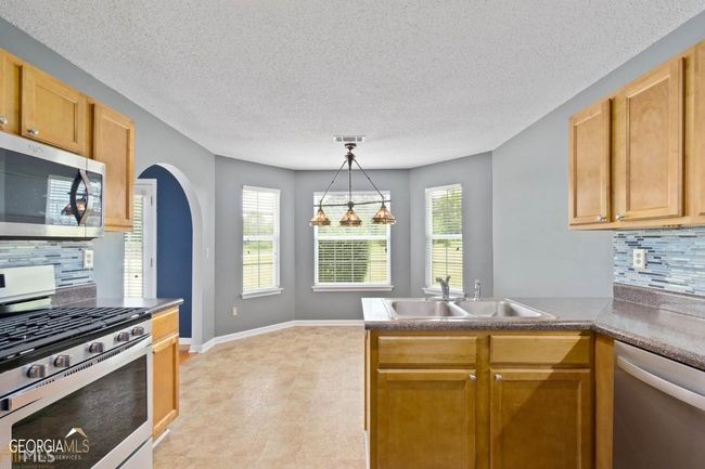 708 Mustang Ct, House other with 4 bedrooms, 3 bathrooms and 2 parking in Hampton GA | Image 6