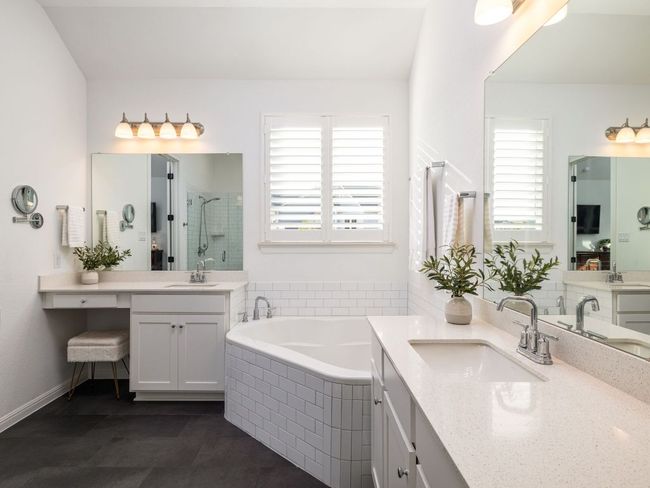 Full bathroom with a sink, a wealth of natural light, and a shower stall | Image 10