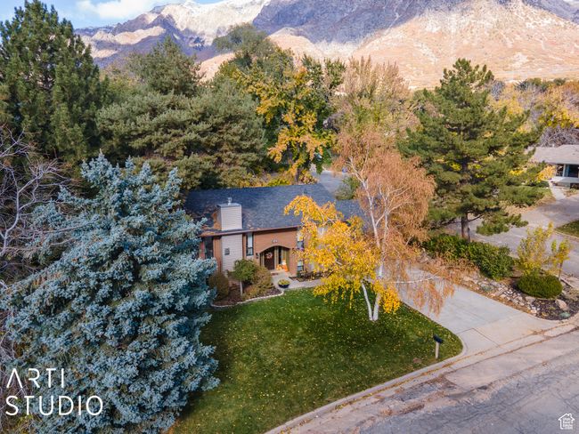 Aerial view of property and surrounding area with mountains | Image 55