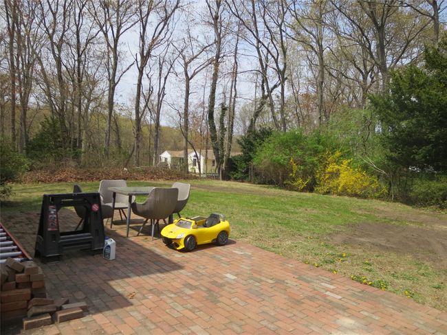 View of patio with outdoor dining area | Image 25