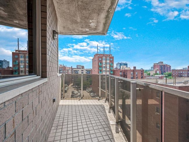 Balcony featuring a view of city | Image 12