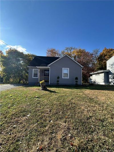 View of front of home with a front lawn | Image 1