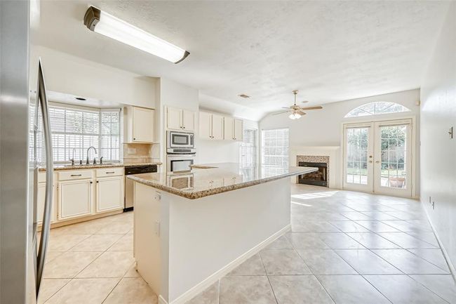 5007 Maple Brook Ln, House other with 4 bedrooms, 2 bathrooms and 2 parking in Kingwood TX | Image 8
