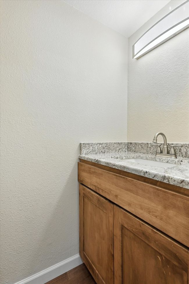 Bathroom featuring vanity and wood finished floors | Image 14