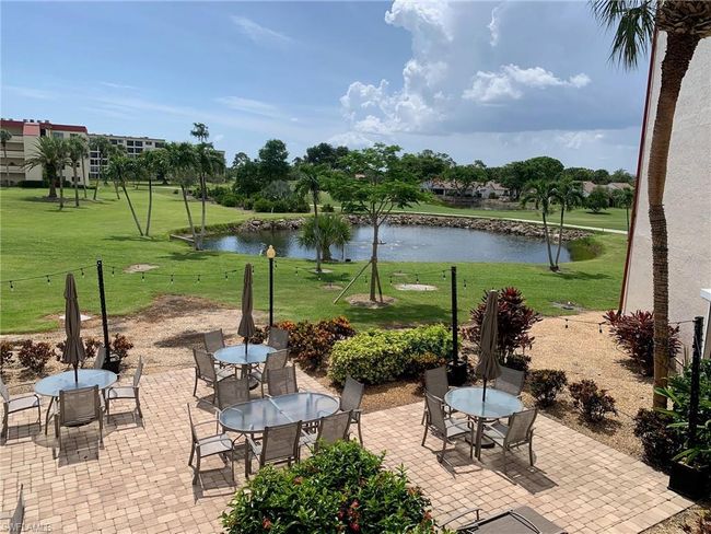 View of patio / terrace with a water view and outdoor dining area | Image 25