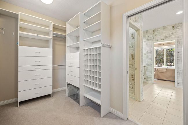 Huge walk-in closet with custom shelving | Image 22