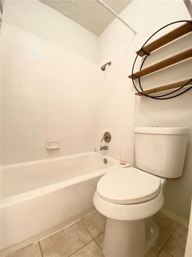 UNIT-903 - 10555 Turtlewood Ct, Townhouse with 2 bedrooms, 2 bathrooms and null parking in Houston TX | Image 19