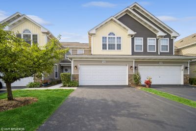 326 E Tall Oaks Lane, Townhouse with 2 bedrooms, 2 bathrooms and 12 parking in Itasca IL | Image 1