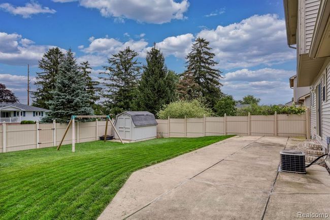 8863 Railwood Drive, Home with 3 bedrooms, 2 bathrooms and null parking in Berlin Twp MI | Image 5