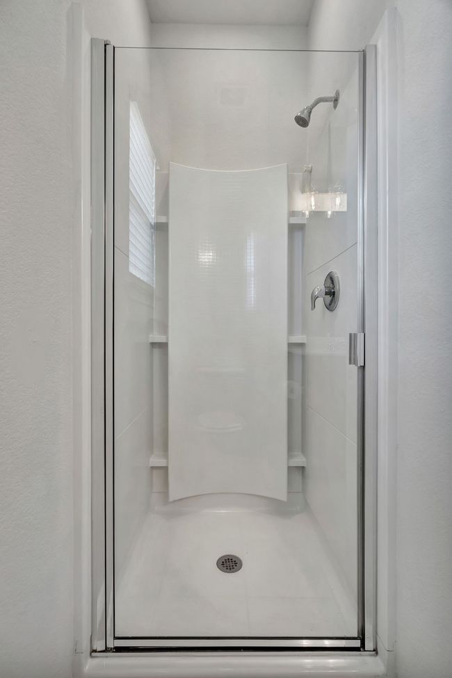 Bathroom featuring a shower stall | Image 20