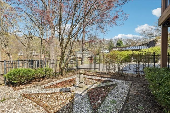 Fenced in area in back of home. | Image 37